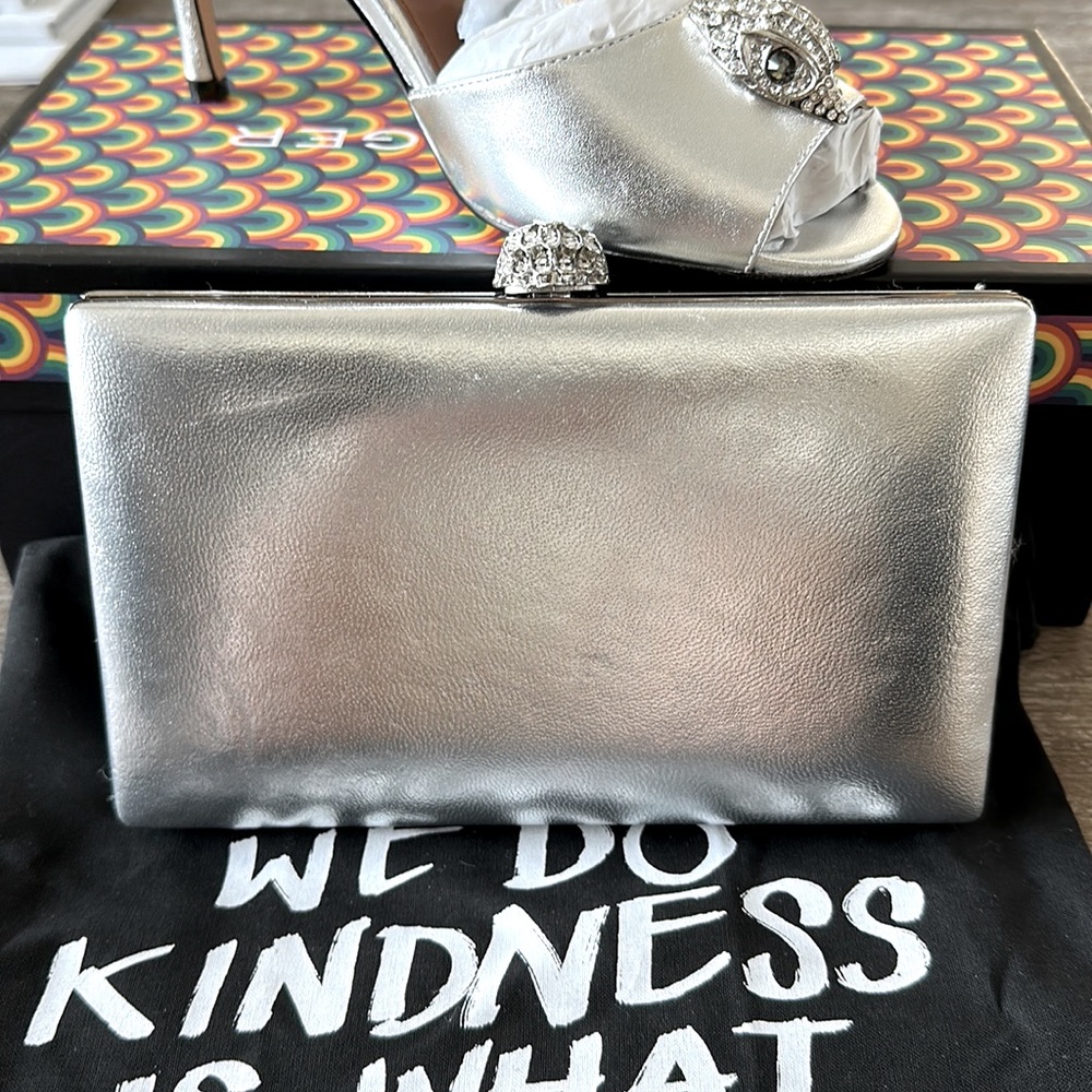 Beautiful Kurt Geiger silver leather embellished clutch